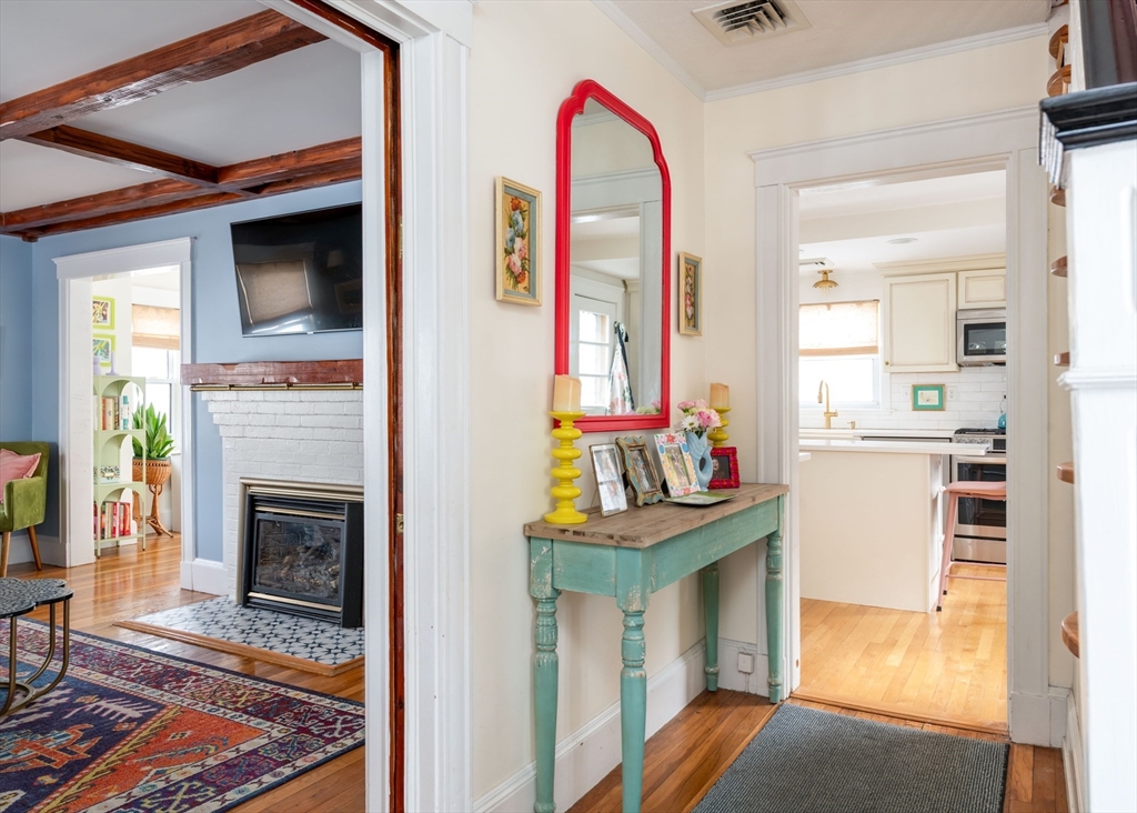 40 Virginia Road Quincy, MA 02169 - Photo 3 of 29 a view of living room with furniture and a fireplace