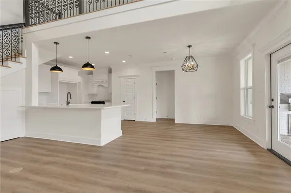 a view of kitchen with wooden floor