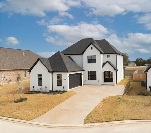 a view of a house with wooden floor and fence