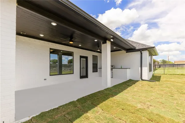 a view of a house with a swimming pool
