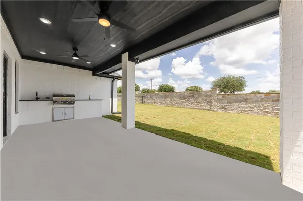 a view of an ocean and a floor to ceiling window