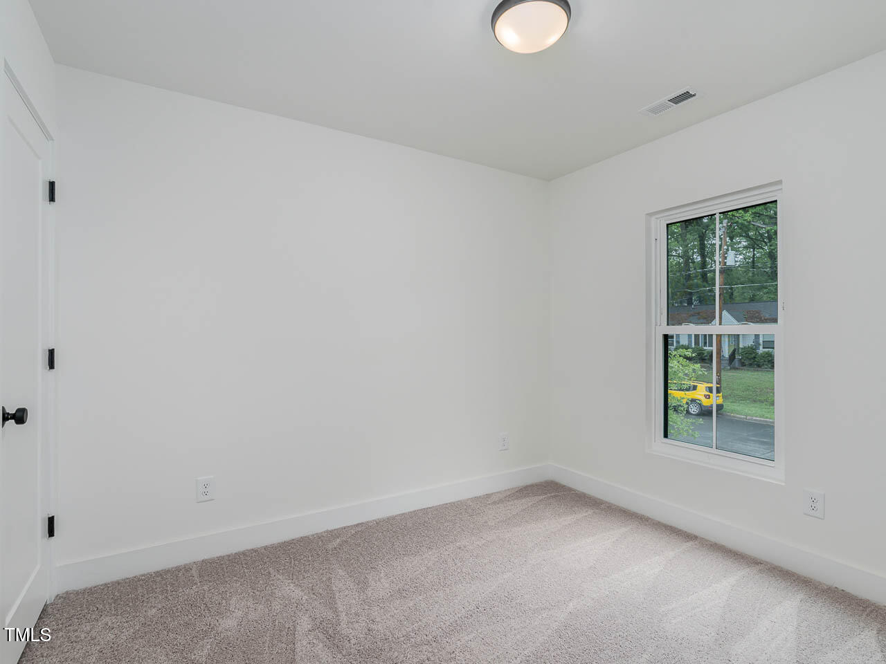 614 East Ellerbee Street Durham, NC 27704 - Photo 12 of 12 an empty room with windows