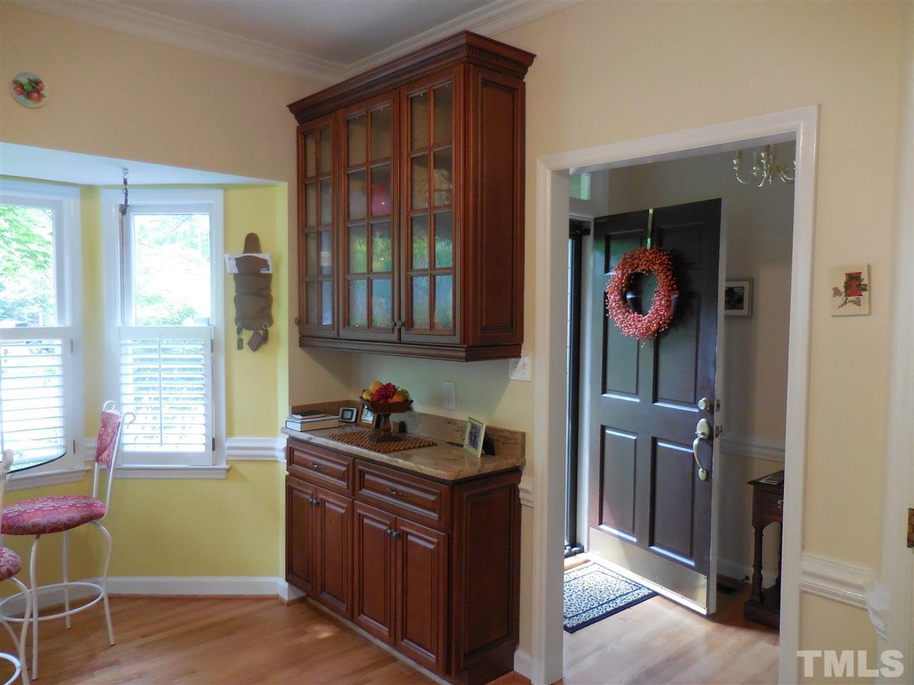 1307 Slatestone Court Raleigh, NC 27615 - Photo 7 of 25 a kitchen with a sink and a window