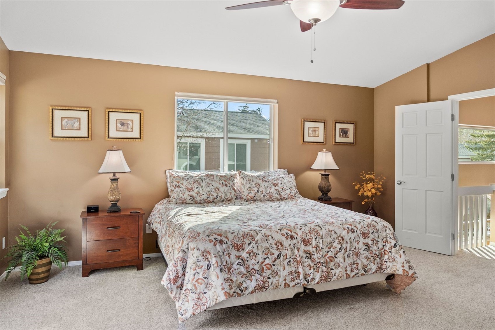 588 Alpine Road Dillon, CO 80435 - Photo 18 of 41 Primary Bedroom featuring light carpet, lofted ceiling, and ceiling fan