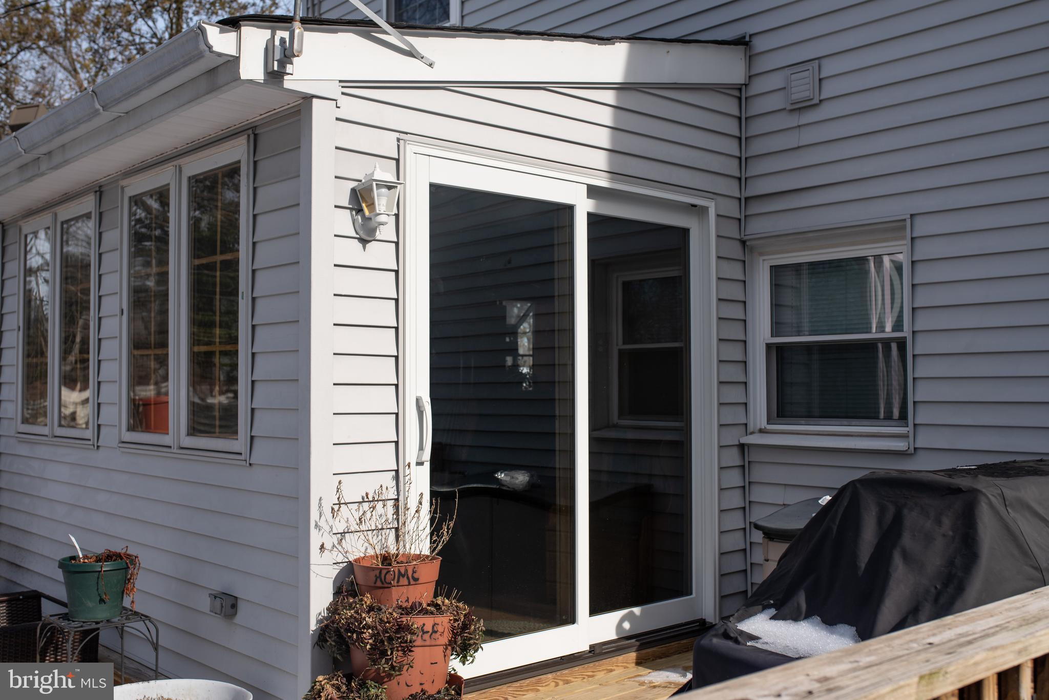 2048 Mill Road Norristown, PA 19403 - Photo 26 of 52 New Pella Sliding Glass Door leads to Deck.