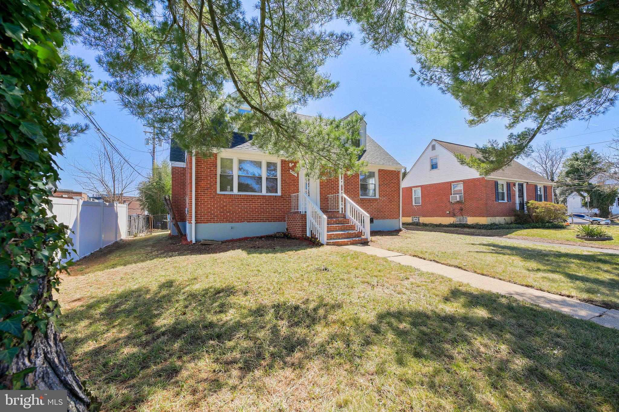 3547 Milford Mill Road Baltimore, MD 21244 - Photo 2 of 44 front view of a house with a yard