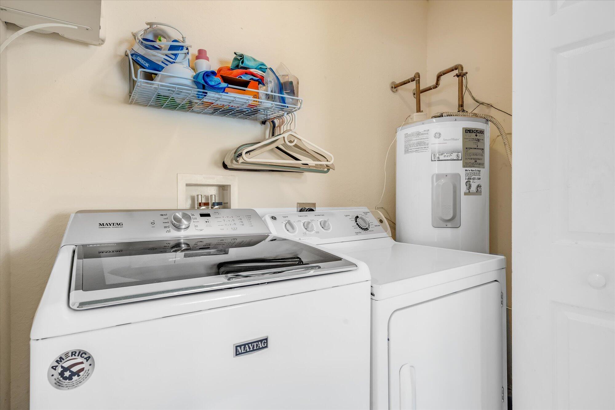 939 Plantation Road Key Largo, FL 33037 - Photo 24 of 38 a utility room with dryer and washer