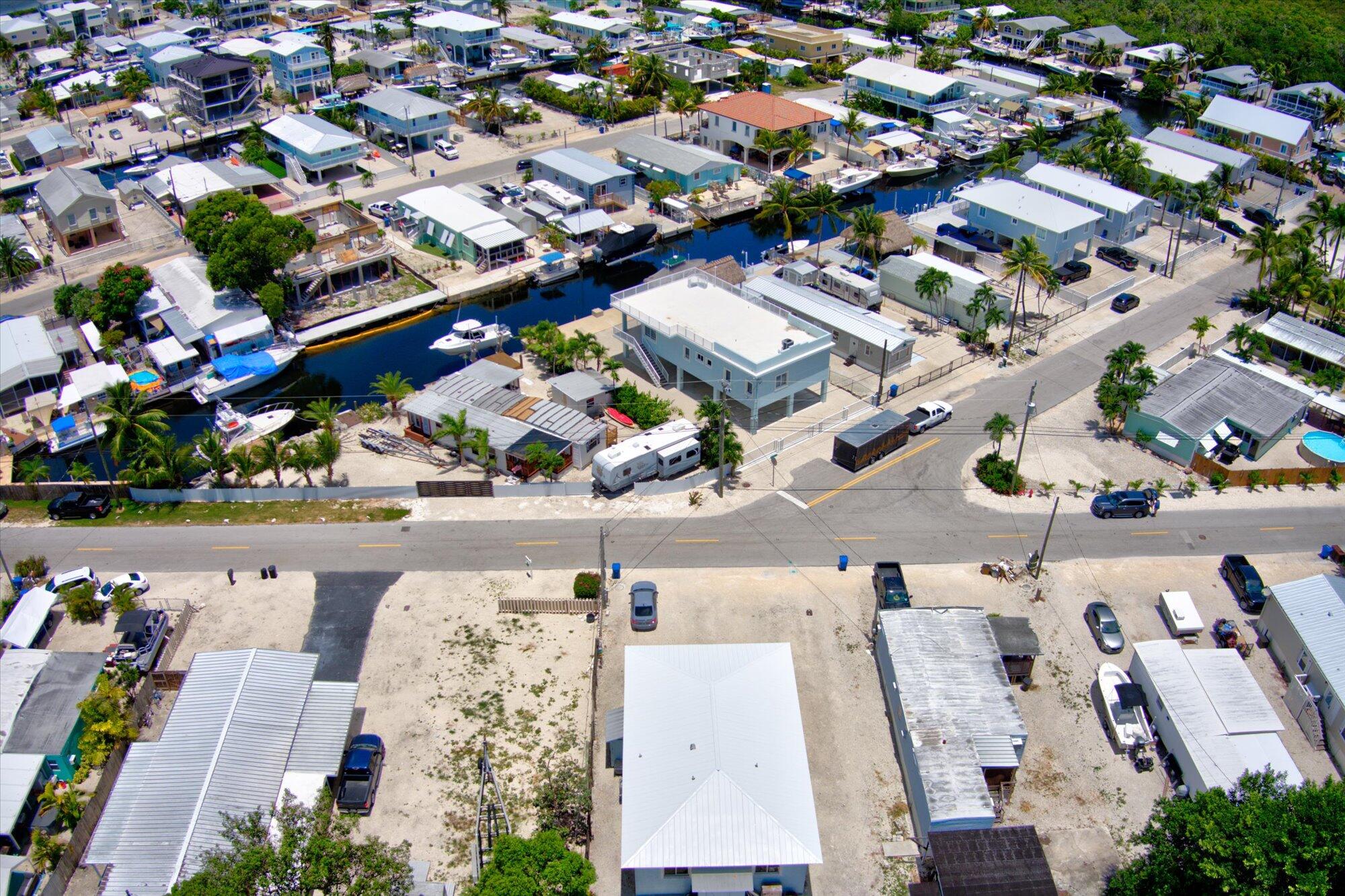 939 Plantation Road Key Largo, FL 33037 - Photo 36 of 38 an aerial view of a city