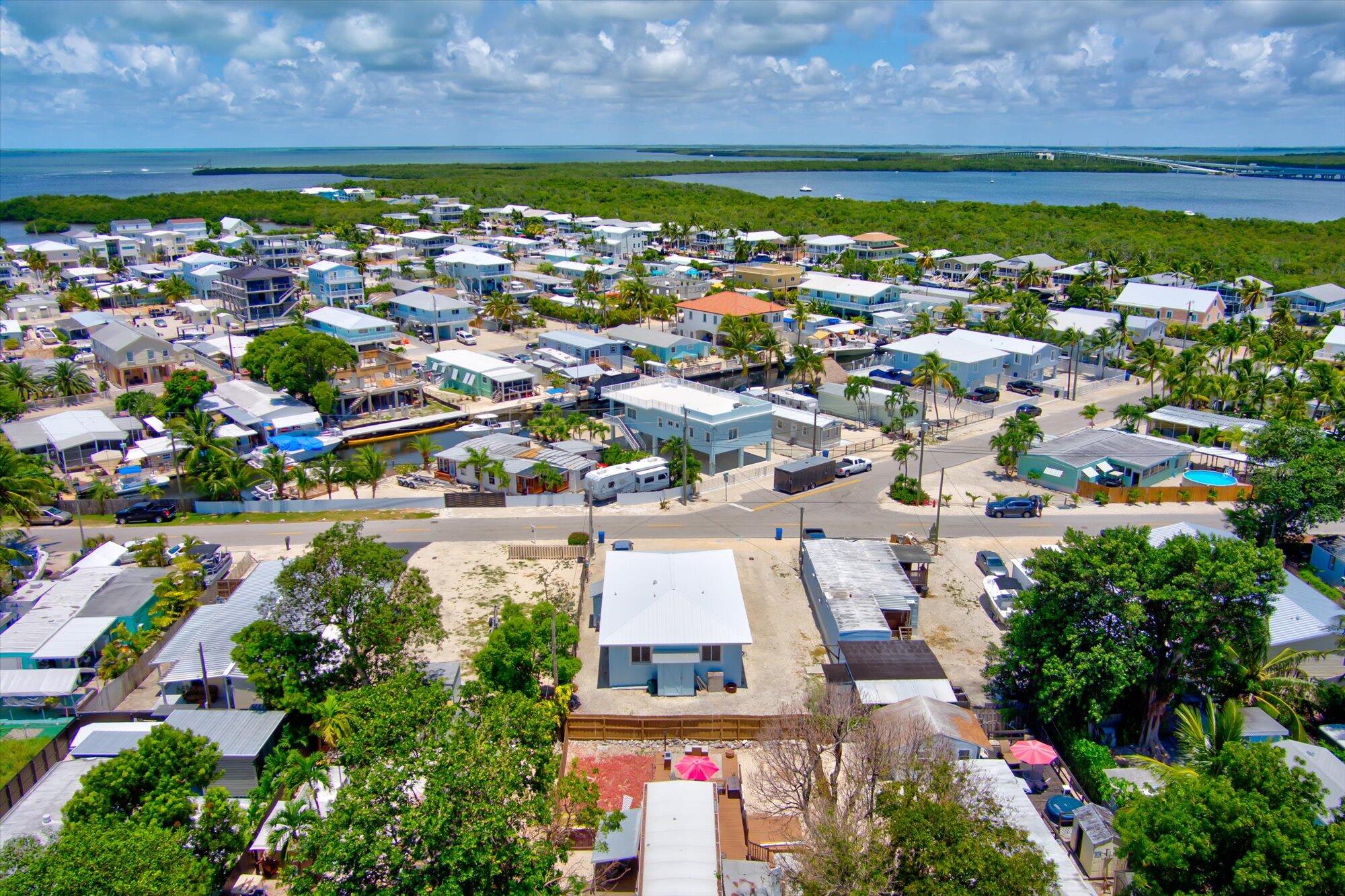 939 Plantation Road Key Largo, FL 33037 - Photo 4 of 38 an aerial view of a residential houses with outdoor space and trees