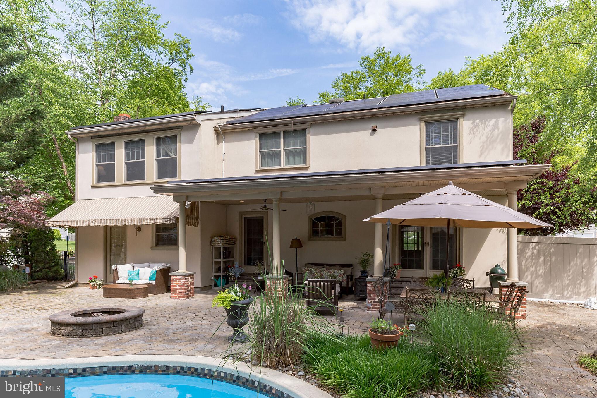 129 Round Hill Road Voorhees, NJ 08043 - Photo 19 of 33 Back view, covered veranda and awning, firepit