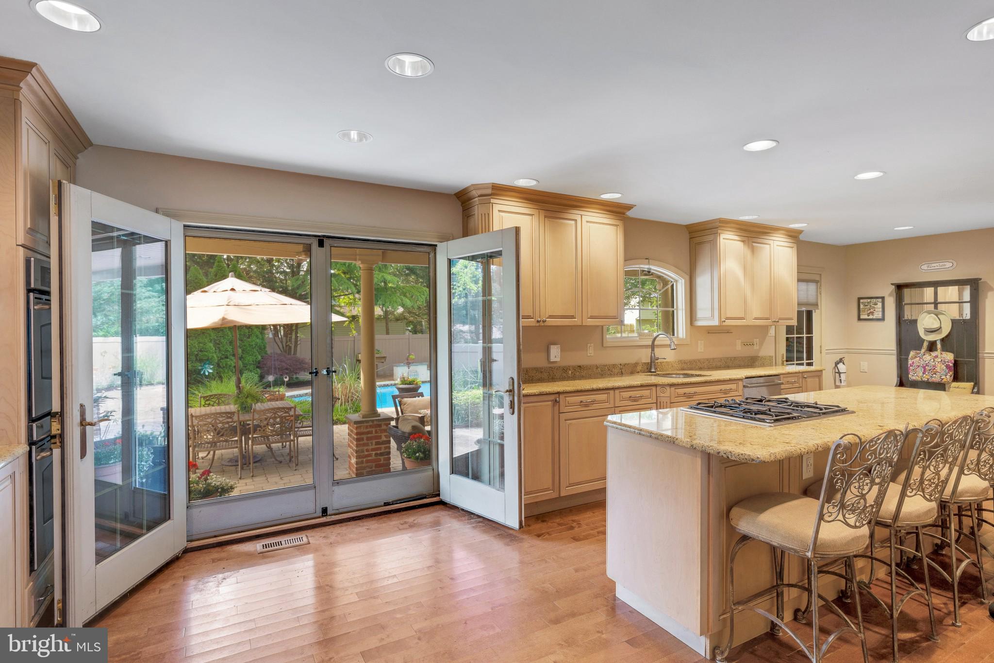 129 Round Hill Road Voorhees, NJ 08043 - Photo 3 of 33 French Doors open to covered Veranda