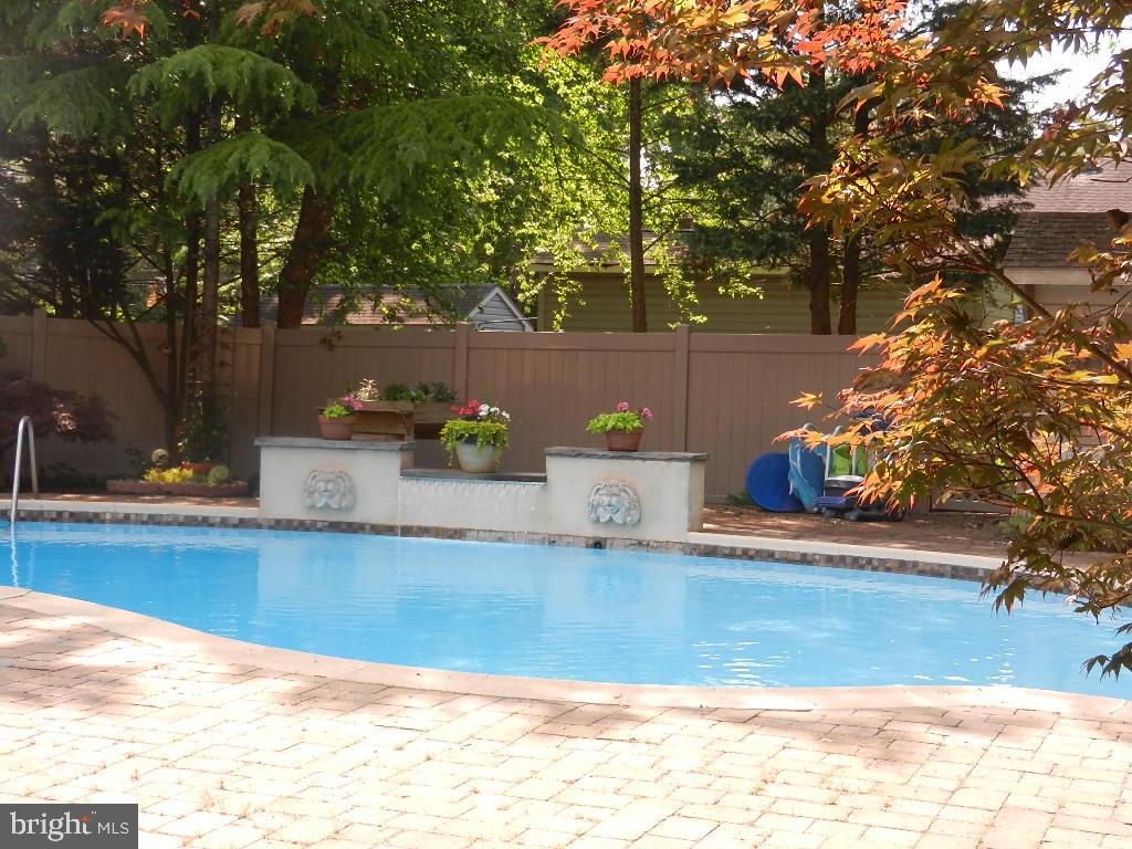 129 Round Hill Road Voorhees, NJ 08043 - Photo 29 of 33 Salt Water Pool has a waterfall