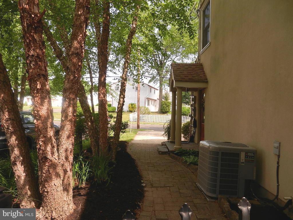 129 Round Hill Road Voorhees, NJ 08043 - Photo 31 of 33 Paver Walkway to pool and side entrance to In-Law