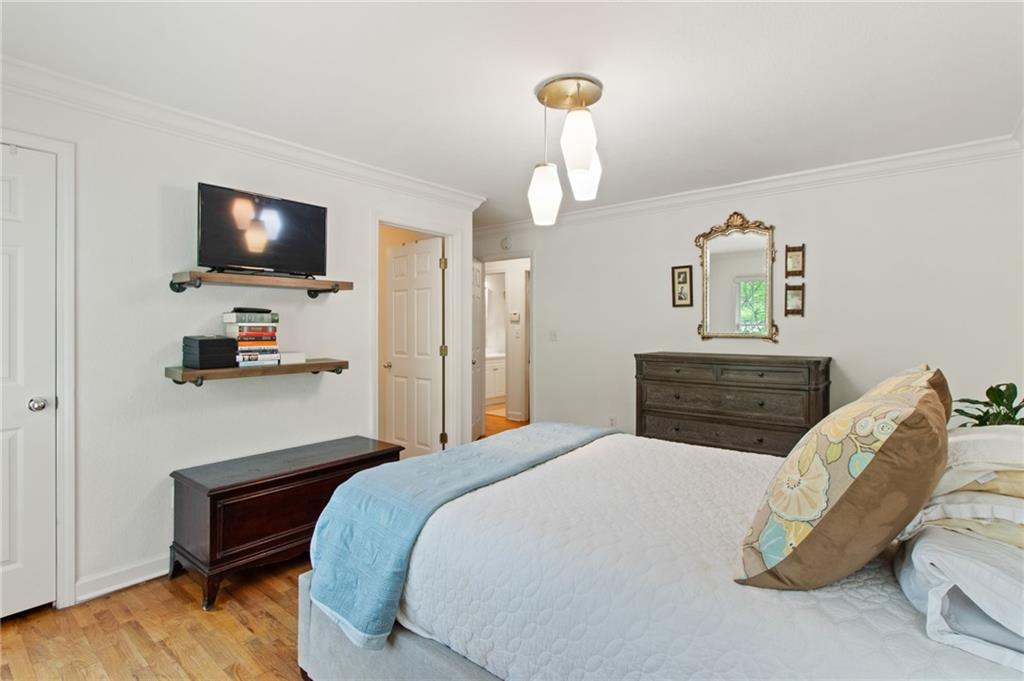 1020 Scott Boulevard, Unit B4 Decatur, GA 30030 - Photo 13 of 20 a bedroom with a bed and a flat screen tv
