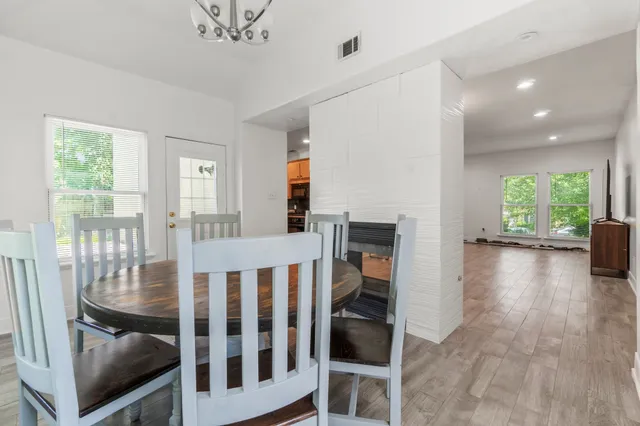 a bathroom with a sink toilet and a mirror