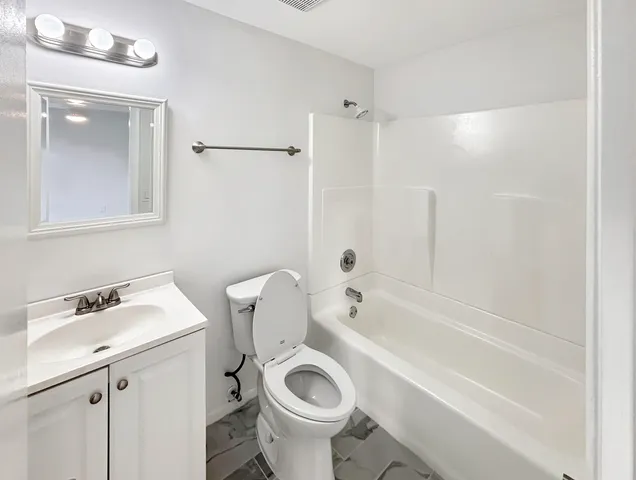 a view of a livingroom with a staircase