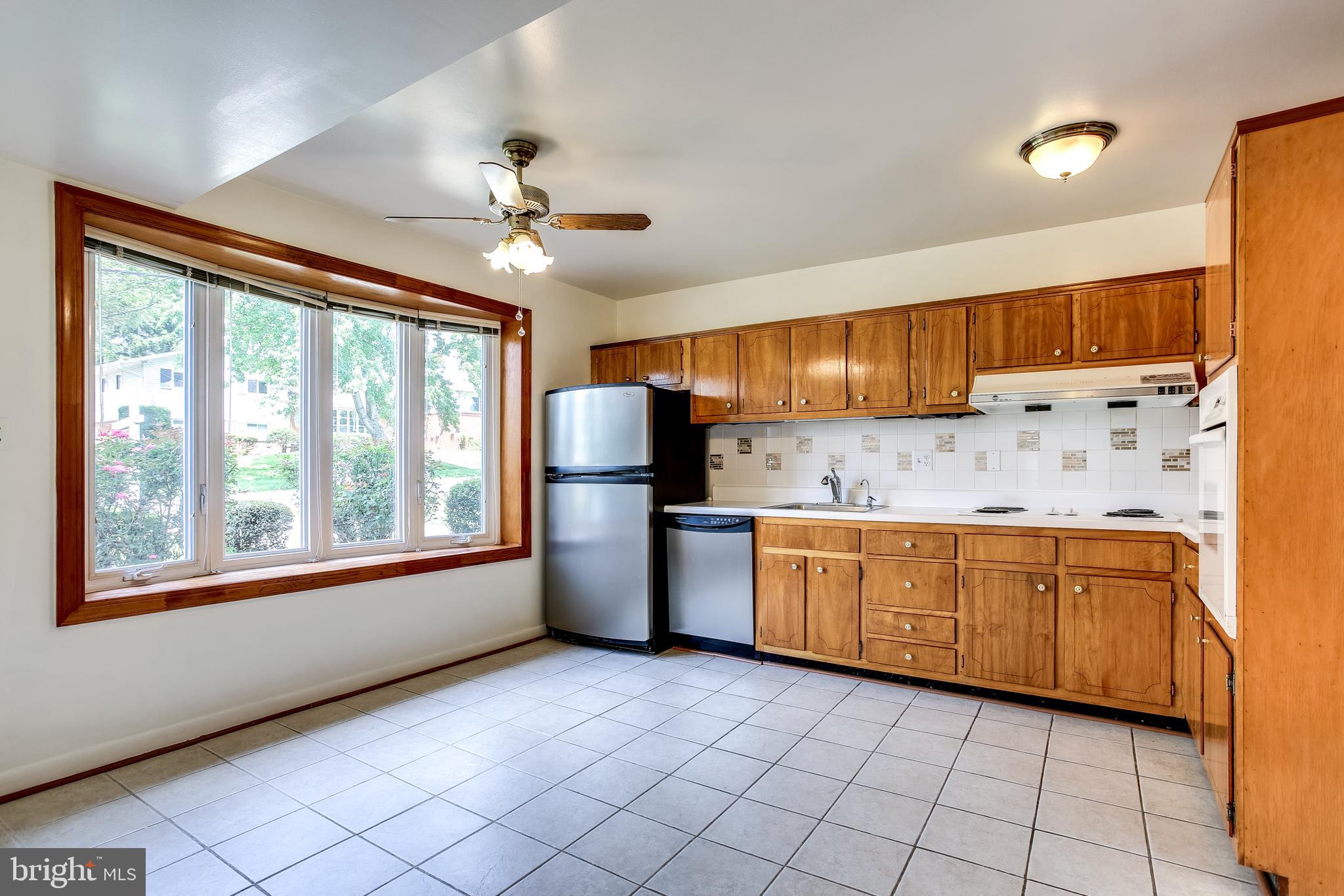 3906 Minden Road Silver Spring, MD 20906 - Photo 6 of 33 Sun-Filled Kitchen with Large Bay Window