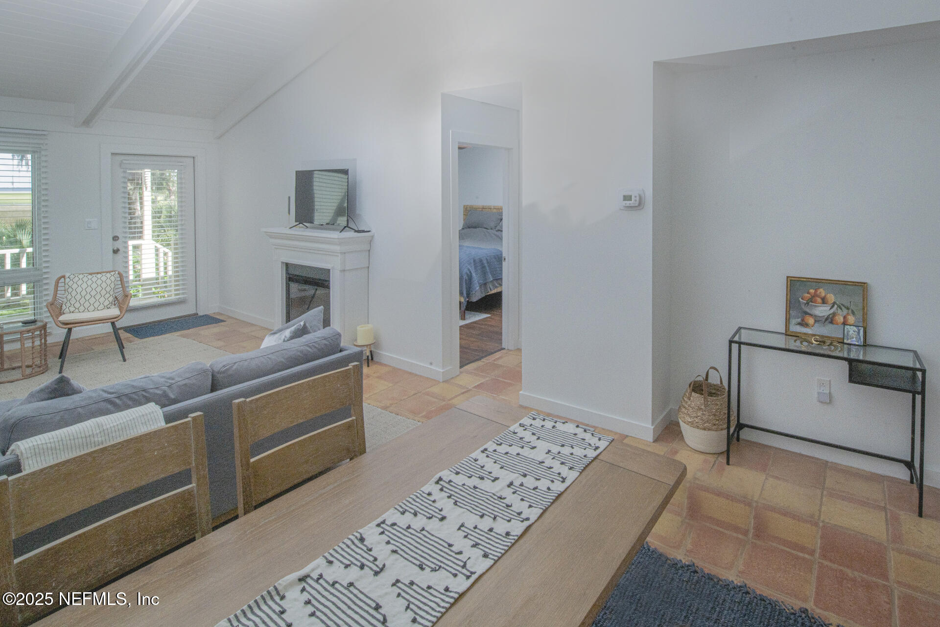 3426 Sea Marsh Road Fernandina Beach, FL 32034 - Photo 33 of 39 a living room with furniture and a rug
