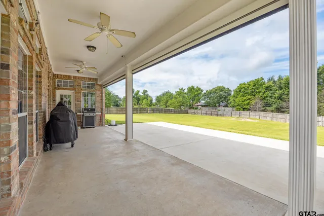 a view of a living room and balcony
