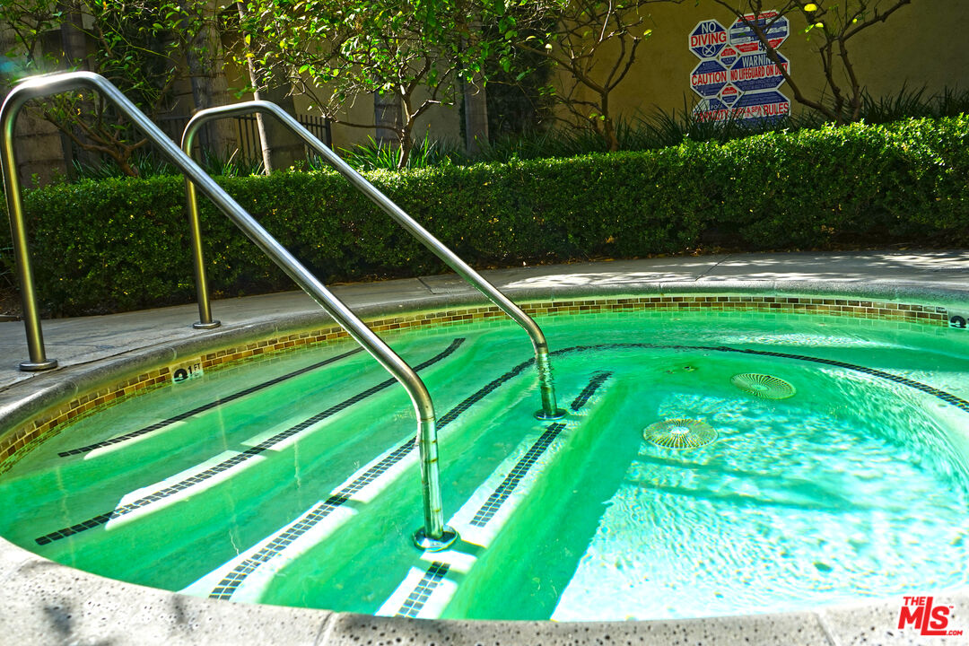 151 East Holly Street, Unit 2201 Pasadena, CA 91103 - Photo 30 of 33 a view of a tennis court