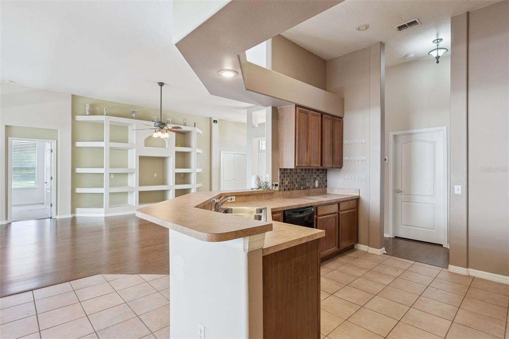 774 Lancer Circle Ocoee, FL 34761 - Photo 11 of 35 a bathroom with a sink a vanity and a mirror