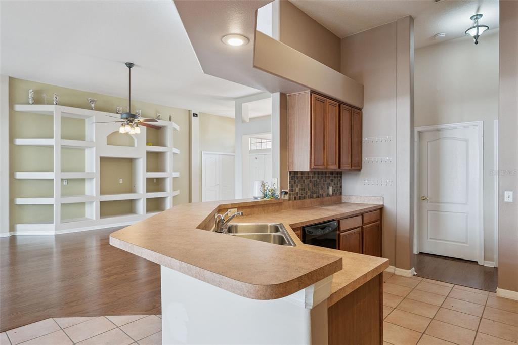 774 Lancer Circle Ocoee, FL 34761 - Photo 12 of 35 a kitchen that has a sink and a stove in it