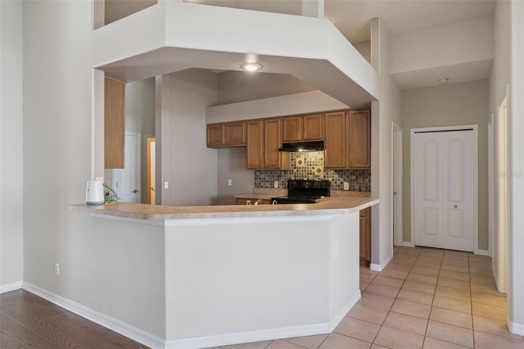 774 Lancer Circle Ocoee, FL 34761 - Photo 14 of 35 a view of kitchen with washer and dryer