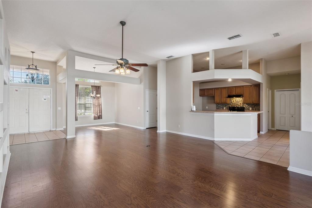 774 Lancer Circle Ocoee, FL 34761 - Photo 4 of 35 a view of a kitchen with a sink and a refrigerator