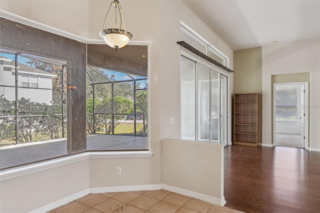 774 Lancer Circle Ocoee, FL 34761 - Photo 10 of 35 a view of empty room with wooden floor and fan