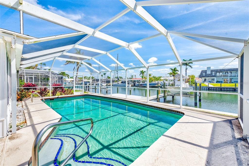 4908 Commonwealth Road Palmetto, FL 34221 - Photo 3 of 15 a view of a swimming pool with a patio