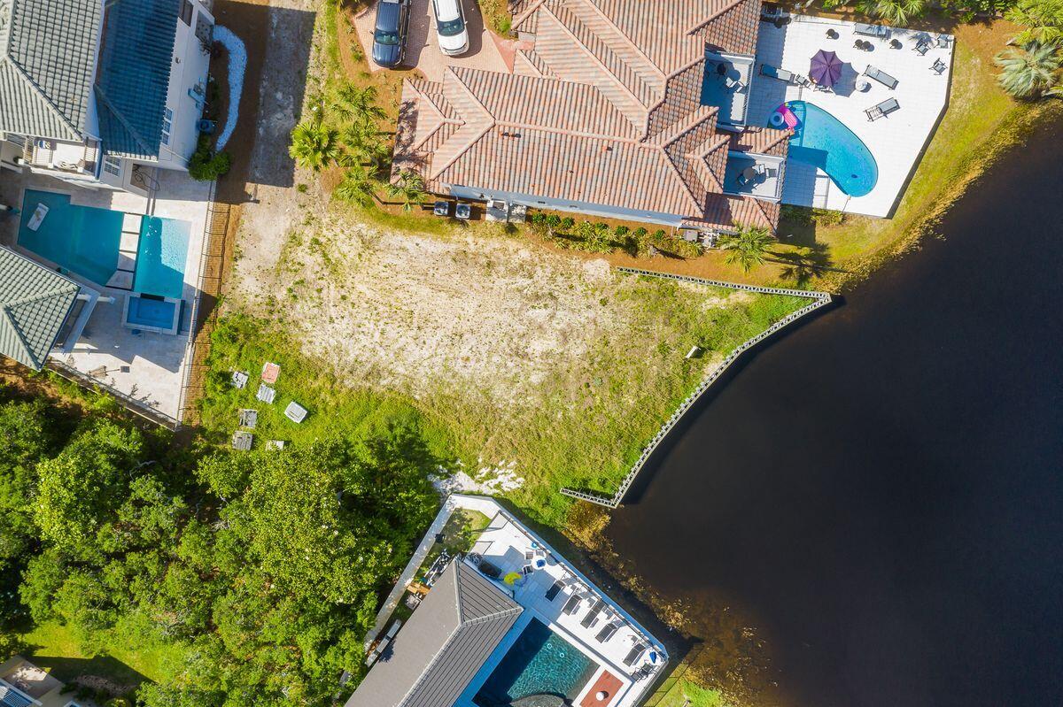 4641 Destiny Way Destin, FL 32541 - Photo 8 of 9 a view of a swimming pool with seating area