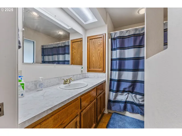 a view of a hallway with workspace