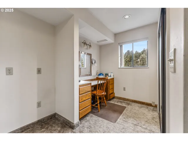 a bathroom with a sink double vanity and a shower