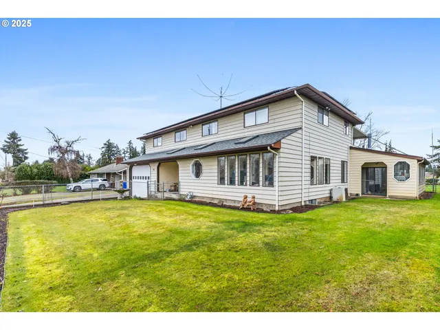 a view of a house with a big yard