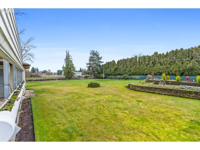 a view of a house with a big yard