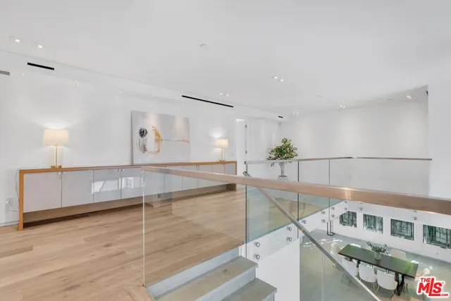 a view of a living room and entryway