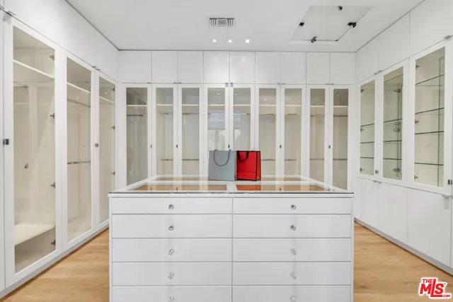 a view of a balcony and trees