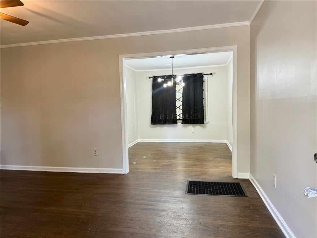 1910 Wildwood Drive Decatur, GA 30032 - Photo 3 of 17 a view of a hallway with wooden floor