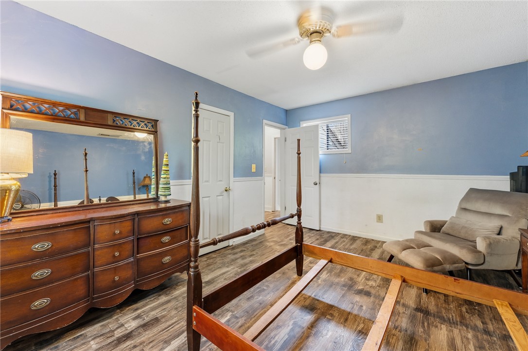 1412 Forest Lane Anderson, SC 29621 - Photo 20 of 31 This spacious bedroom features ample light and durable flooring, perfect for comfortable living.