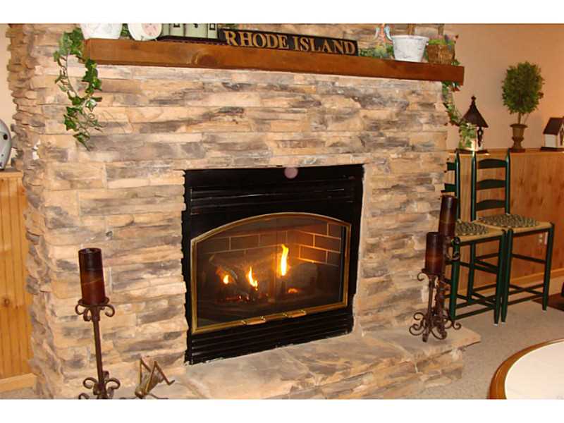 168 Black Pond Road Charlestown, RI 02813 - Photo 11 of 25 Other. Walk out lower level family room w/ gas fireplace