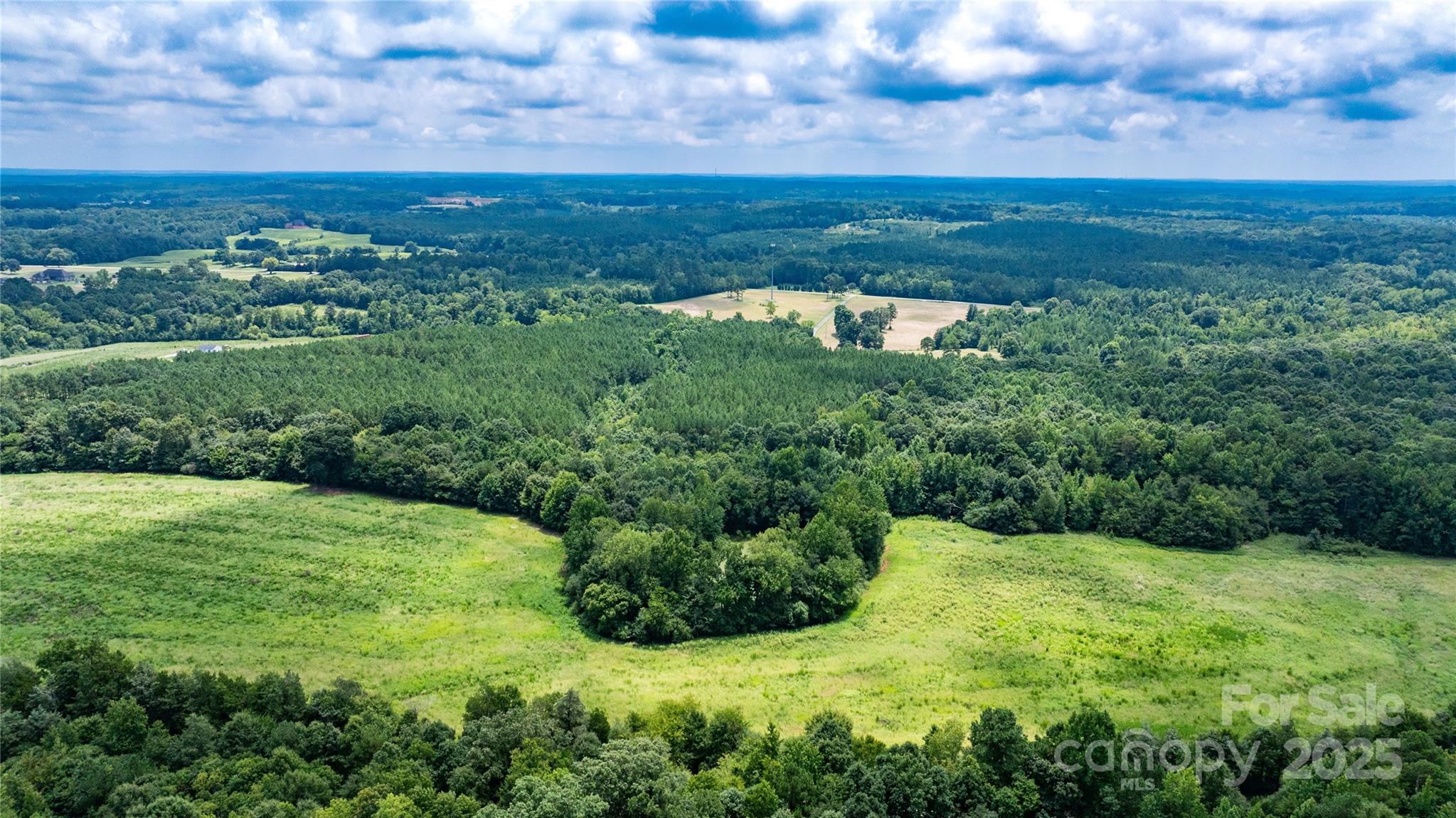 0 Daystar Road, Unit 16 Lancaster, SC 29720 - Photo 3 of 20 a view of a big yard with a large tree