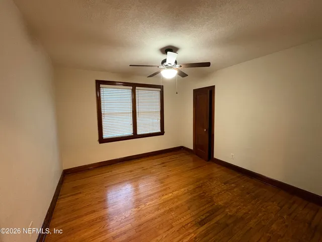a view of an empty room with window