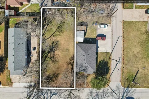 a aerial view of residential houses with outdoor space