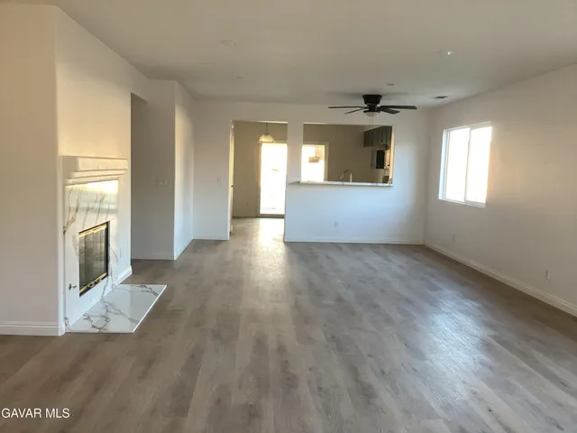 a view of an empty room and window