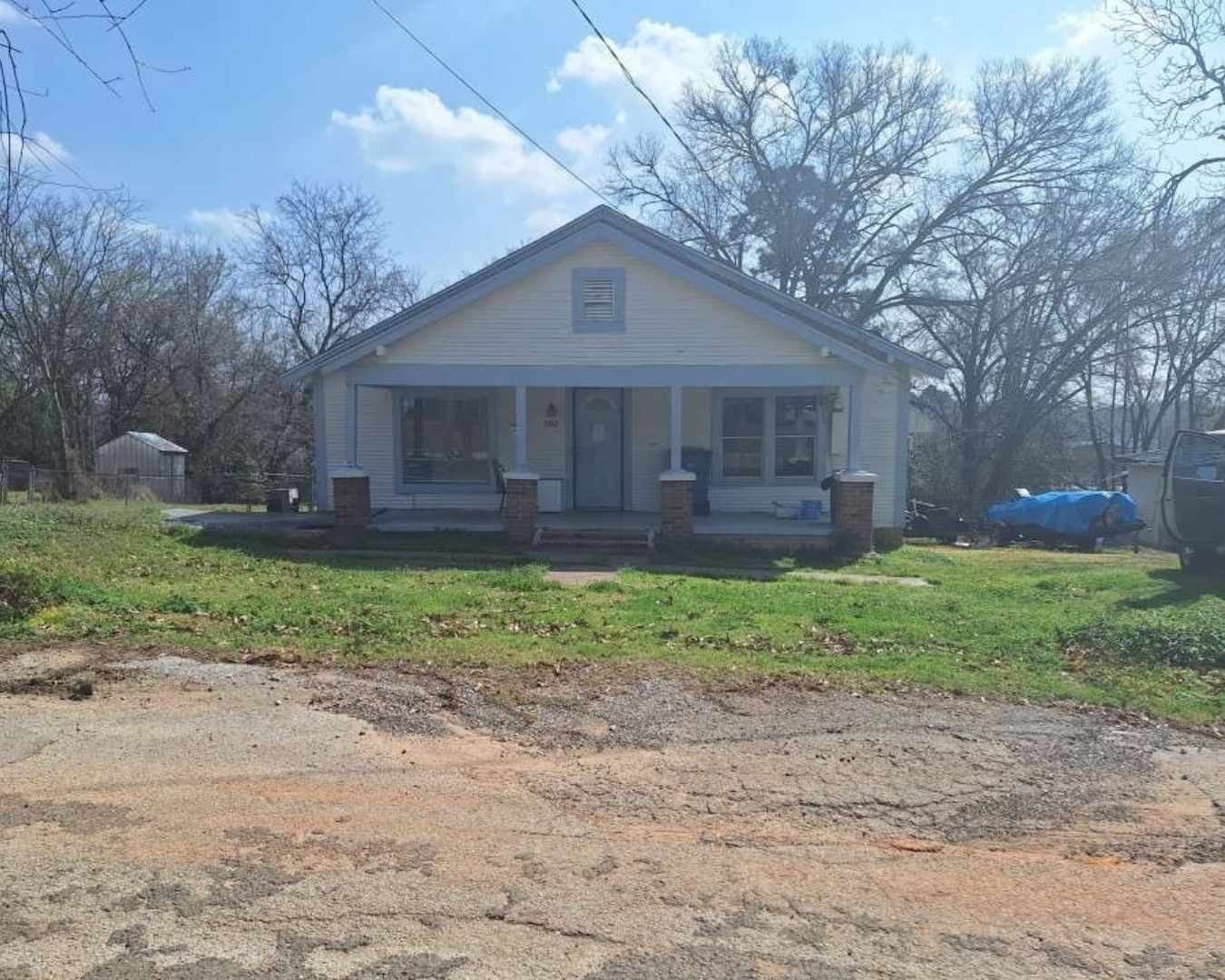 202 Phillips Street Arp, TX 75750 - Photo 2 of 8 a front view of house with a garden