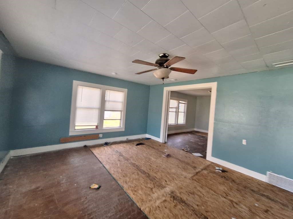 202 Phillips Street Arp, TX 75750 - Photo 4 of 8 a view of an empty room with a window