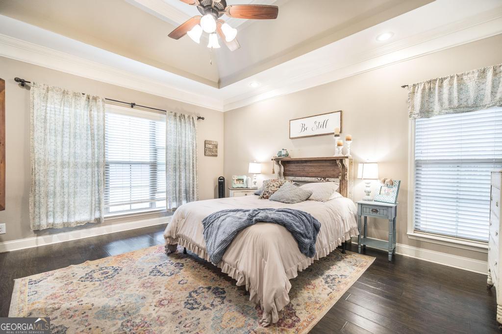 312 Bridgehampton Way Perry, GA 31069 - Photo 18 of 34 a bedroom with a large bed and a large window