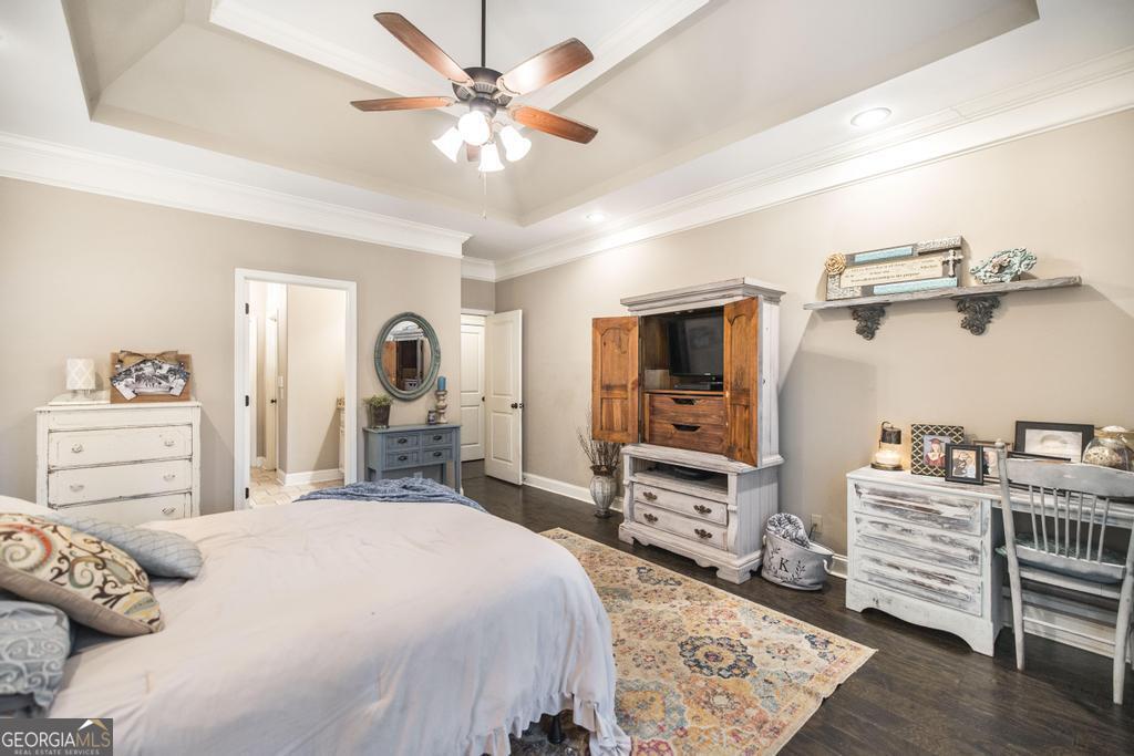 312 Bridgehampton Way Perry, GA 31069 - Photo 19 of 34 a bedroom with a bed and furniture