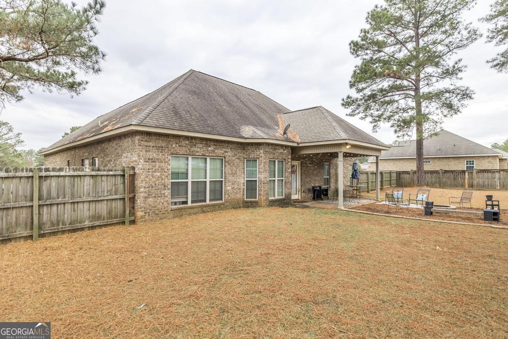 312 Bridgehampton Way Perry, GA 31069 - Photo 31 of 34 a view of a house with a outdoor space