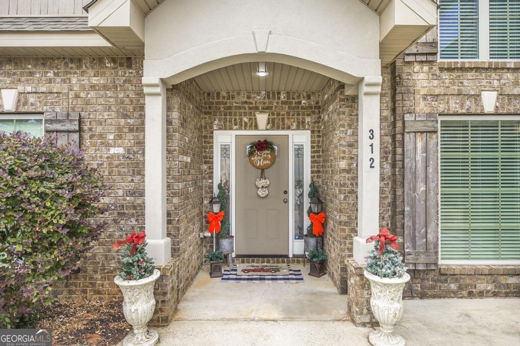 312 Bridgehampton Way Perry, GA 31069 - Photo 6 of 34 a front view of a building
